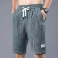 Sleeping Pants Ice Silk Shorts Men Casual Shorts Loose 5-Minute Pants Solid Youth Home Shorts Elastic Waist Large Pajama Pants.