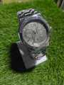 CD Collection Stylish Silver Tone Metal Band Chronograph Watch. 
