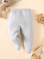 his 8-piece unisex newborn layette set fits boys and girls aged 0-9 months, with lovely grey bear prints..