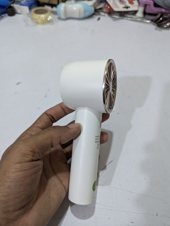 Portable%20DP-7648A%20Handheld%20High%20Speed%20Fan%202000mAh%20Rechargeable%20Battery%203%20Speed%20Settings%20Personal%20Cooling%20Fan%20White%20Minimalist%20Body%20Design%20Ideal%20for%20Travel%20Camping%20Hiking%20Includes%20USB-C%20Fast%20Charging%20Interface%20and%20Desktop%20Stand.%20-%20Image%204