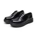 Black half lessup martin shoes. 