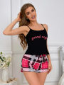 Women's new pajama suspender solid color top plaid shorts two-piece set of home wear. 