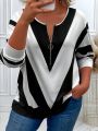 Plus Size Women's V-Neck Geometric Striped Long Sleeve Top with Zipper Detail for Chic and Modern Style. 
