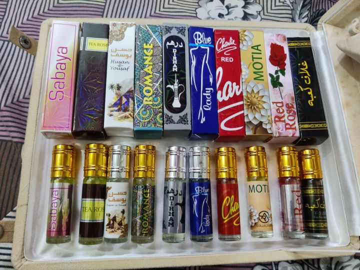 Premium%20Arabic%20Attar%20Perfume%20Oils%20%E2%80%93%20Alcohol-Free%20Long-Lasting%20Fragrances%20(Sabaya,%20Tea%20Rose,%20Husan-e-Yousaf,%20Romance,%20Dirham,%20Blue%20Lady,%20Charlie%20Red,%20Motia,%20Red%20Rose,%20Ghazal%20Kalema)%20%E2%80%93%20Roll%20On%20Attar%206ml%20Each%20-%20Image%202