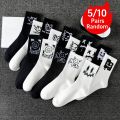 Random multiple pairs of men's crew socks graffiti ghost face unique street trend moisture wicking. 