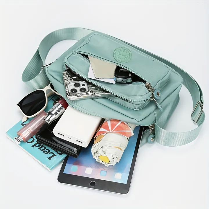 Lightweight%20Nylon%20Chic%20Crossbody%20Bag%20for%20Women%20-%20Adjustable%20Strap,%20Zip%20Closure,%20Tassel%20Accent,%20Solid%20Color%20-%20Image%205