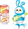 Electronic Dancing Rabbit Guitarist with Music Flashing Lights, 360 Degree Rotating and Sensing Interactive Fun Toy for Children (Color May Vary). 
