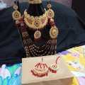 Latest design New bridal Jewelry set with matha pati in red colour. 