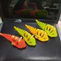 Clockwork plastic fish Simulation animal plush jumping stail children's toys -1pcs.