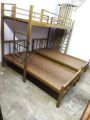 Metal Bunk Bed Frame over Two Single Wrought Iron Beds. 