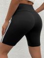 High Stretch Plus Size Athletic Shorts for Women Sporty Knit Mid Thigh Pants with Side Stripes Fashionable and Comfortable Pants.