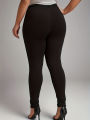 Plus size  Women's oversized leggings with lace patchwork and contrasting hollow out design, slim fit and slimming pants. 