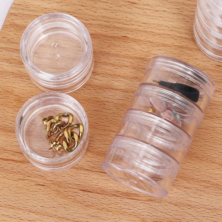 Mini%20Round%20Jewelry%20Storage%20Box%20(5%20Layer)%20%E2%80%93%20Transparent%20Acrylic%20Organizer%20for%20Rings,%20Earrings,%20Studs%20&%20Small%20Accessories%20%7C%20Compact%20360%C2%B0%20Rotating%20Jewelry%20Case%20for%20Dressing%20Table%20&%20Travel%20-%20Image%205