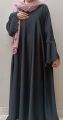 black colour imported nida fabric latest abaya with premium quality nug work on sleeves and front. 
