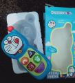 Doraemon Musical Cartoon Mobile Phone Toy with Colorful Light Effects and Wonderful Music Sound for Baby Kids. 