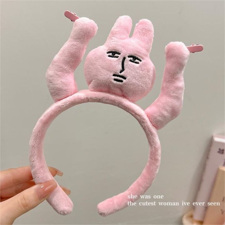 Fun raising hands, pulling hair, pink rabbit headband, funny headband, grabbing bangs, tying hair, cartoon headband