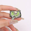 Skeleton Hand In Fist Holding Dollar Bills Enamel Pins Custom Punk Gothic Skull With Dollar Brooch Lapel Badge Halloween Jewelry. 