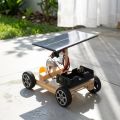 DIY handmade assembly model of solar electric vehicle for children 3D wooden puzzle STEM educational toys creative invention. 
