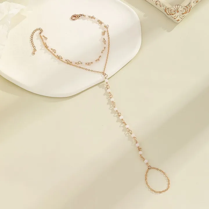 Multi%20Layer%20Pearl%20Finger%20Ring%20Bracelet%20for%20Women,%20Faux%20Pearl%20Elegant%20Accessory%20for%20Weddings,%20Dates,%20and%20Parties%20-%20Image%202