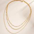 Gold layered chain necklace. 