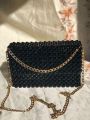 Black Pearl bag with chain or  handle. 