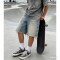 Summer men's loose straight denim shorts with high street splatter ink and raw hem breathable and stylish for daily outdoor wear. 