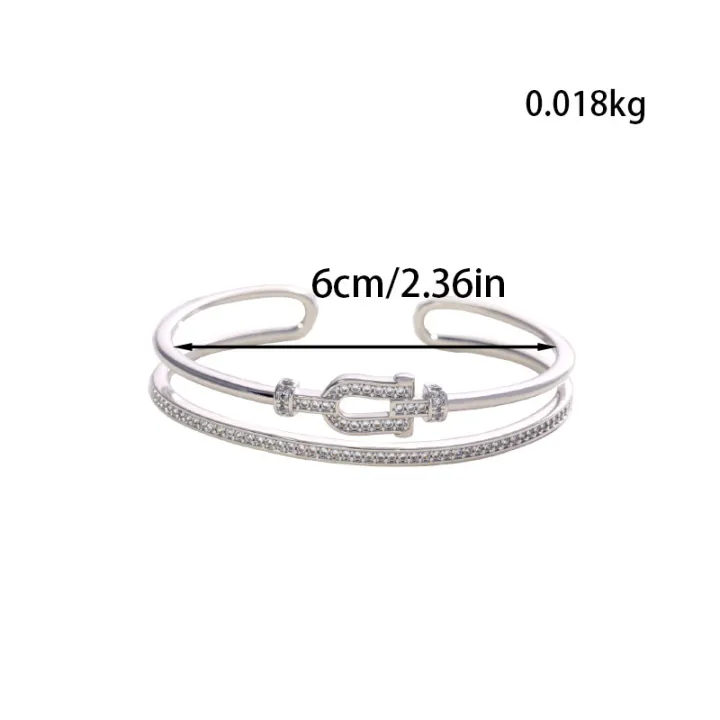 A%20high-quality%20bracelet%20featuring%20U-shaped%20elements%20set%20with%20zirconia%20stones%20and%20an%20open%20design,%20with%20exquisite%20craftsmanship.%20-%20Image%206
