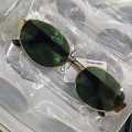 Unisex Metal Summer Sunglasses for Men and Women - Retro Oval Fashion Style with Gold Frame.