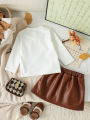 Baby Girls Clothing Set Spring Autumn Short Style Bow Long Sleeve Top+Leather Short Skirt 2Pcs For 3-24M Girls Stylish Outfit. 