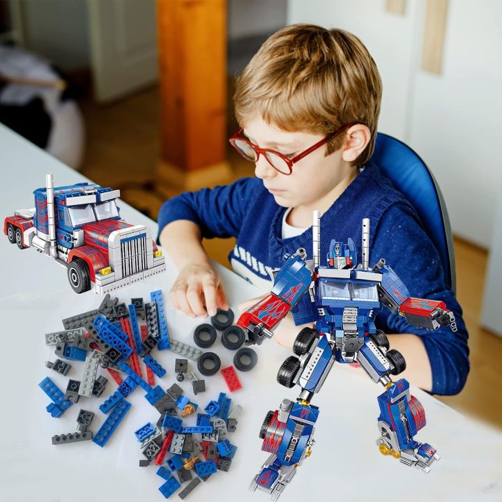 Super%20Warrior%20Optimus%20Prime%20%E2%80%93%20413PCS%20Transforming%20Robot%20Building%20Blocks%20Set%20%7C%202-in-1%20Creative%20Construction%20Kit%20for%20Kids%20%7C%20Buildable%20Robot%20and%20Truck%20Toy%20with%20Manual%20%7C%20STEM%20Educational%20Toy%20Gift%20for%20Boys%20&%20Girls%20Age%206+%20-%20Image%202