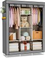 Portable Closet Wardrobe for Hanging Clothes with 2 Hanging Rods and 8 Storage Organizer. 