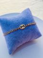 Gucci Adjustable Bracelet with zirconium stone premium quality gold colour. 