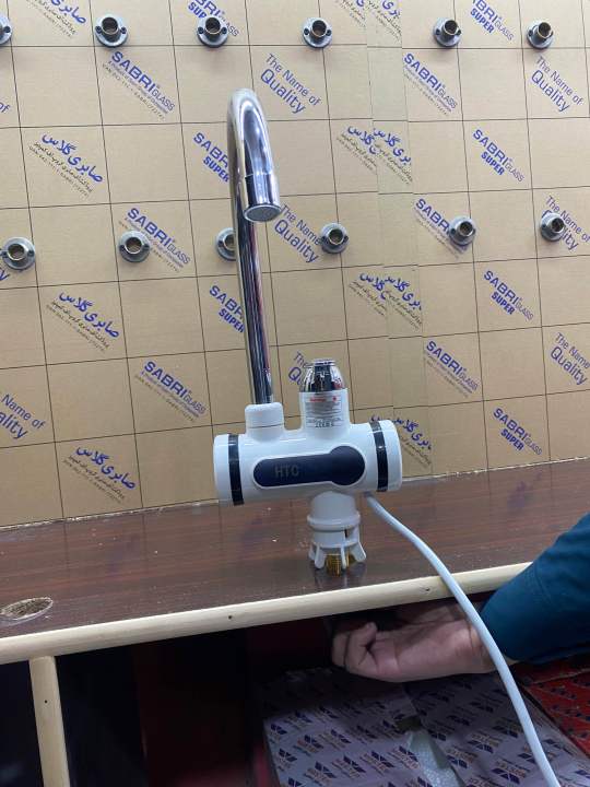 nstant%20Electric%20Hot%20Water%20Heater%20Tap%20with%20Shower%20Attachment%20%7C%20Fast%20Heating%20Electric%20Water%20Tap%20for%20Bathrooms%20&%20Kitchens%20-%20Image%202