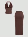 New Fashionable and Elegant Hanging Neck Top+Split Simple Solid Half Skirt Set. 