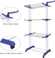 :*New Three Layers Clothes Drying Stand Rack Heavy Duty Double Pole Foldable Cloth Dryer Clothes Drying Stand*. 