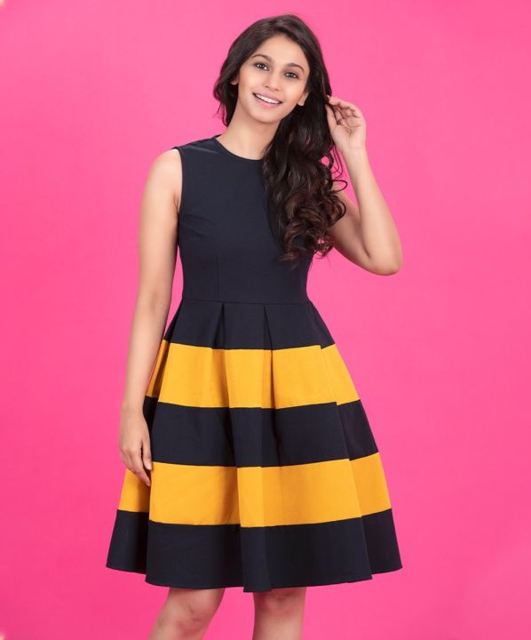 two colour dress design Two-Tone Dresses Are Spring's Latest Big Trend