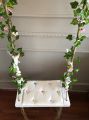 luxury wood swing with flower. 