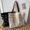 2026 Canvas Bag Womens Handbag Shopping Bag Cute Cat Zipper Handbag Designer Bag Japanese Style Cartoon Small Shoulder Bag. 