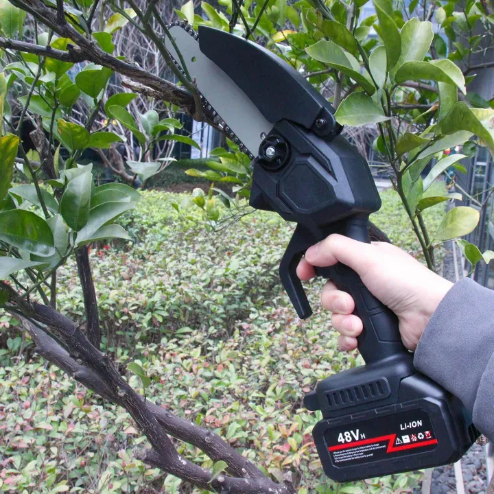 Mini%20Chainsaw%20Cordless%206-Inch%20Portable%20Electric%20Handheld%20Chainsaw%20with%20Security%20Lock,Battery%20Powered6000mah%20Rechargeable%20Super%20Saws%20for%20Wood%20Cutting%20Tree%20Trimming%20DIY%20Projects%20Gardening%20Camping%20-%20Image%203