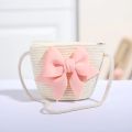 Cute Bow Straw Shoulder Bags Baby Girls Handmade Woven Crossbody Bag Princess Kids Messenger Bags Mini Coin Purse Beach Handbags.