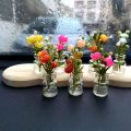 Mini flowers with clear glass vest gift car decorations mini present. 