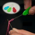 pack of 2 sui me dhaga dalnay wala gadget. 