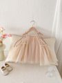 Girls ins strap dress, summer new Korean girls sweet princess dress mesh strap dress, suitable for going out.