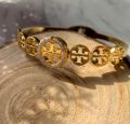 golden colur beautiful breclet for girls. 