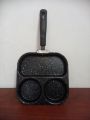 4 and 3 hole non stick frying pan  with handle. 