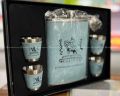 CHINGGIS KHAAN MONGOLIA HIP FLASK WITH LEATHER COVER. 