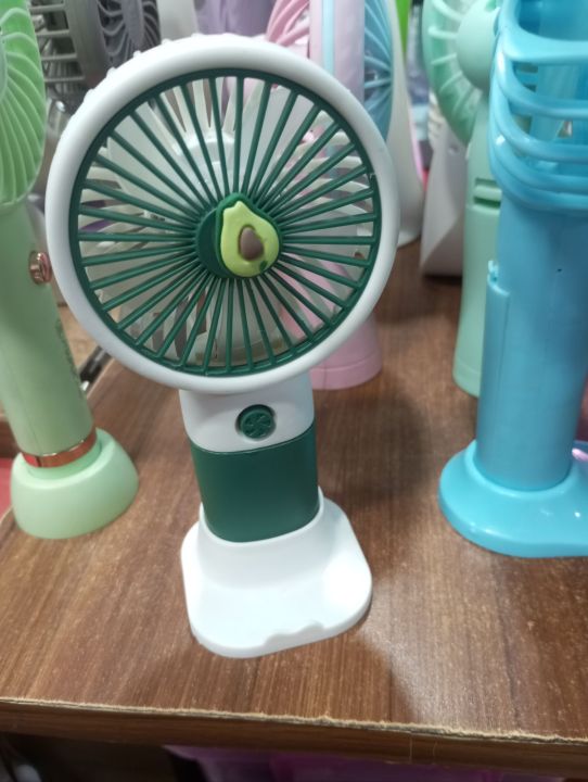 Mini%20Avocado%20Rechargeable%20Handheld%20Fan%20with%20Portable%20Base%20Stand%20-%20Image%203