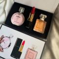 Gift set with 2 Chanel perfumes and matching lipstick for women. 