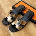 HERMES ORAN FLAT SANDALS. 