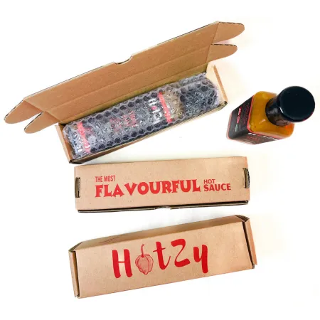 Hotzy%20250ml%20Snake%20Bite%20Hot%20Sauce%20made%20with%20Pineapple-%20A%20rich%20pineapple%20based%20Hot%20sauce%20made%20with%20Scotch%20Bonnet%20Nai%20Miris%20-%20Image%203